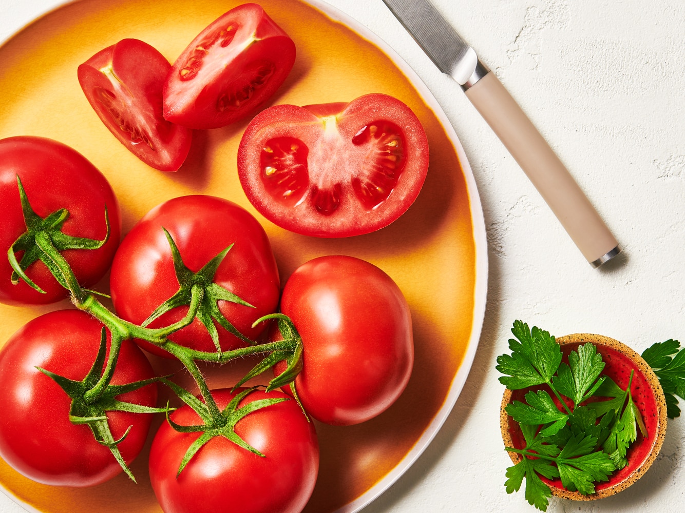 Image of tomatoes on the vine